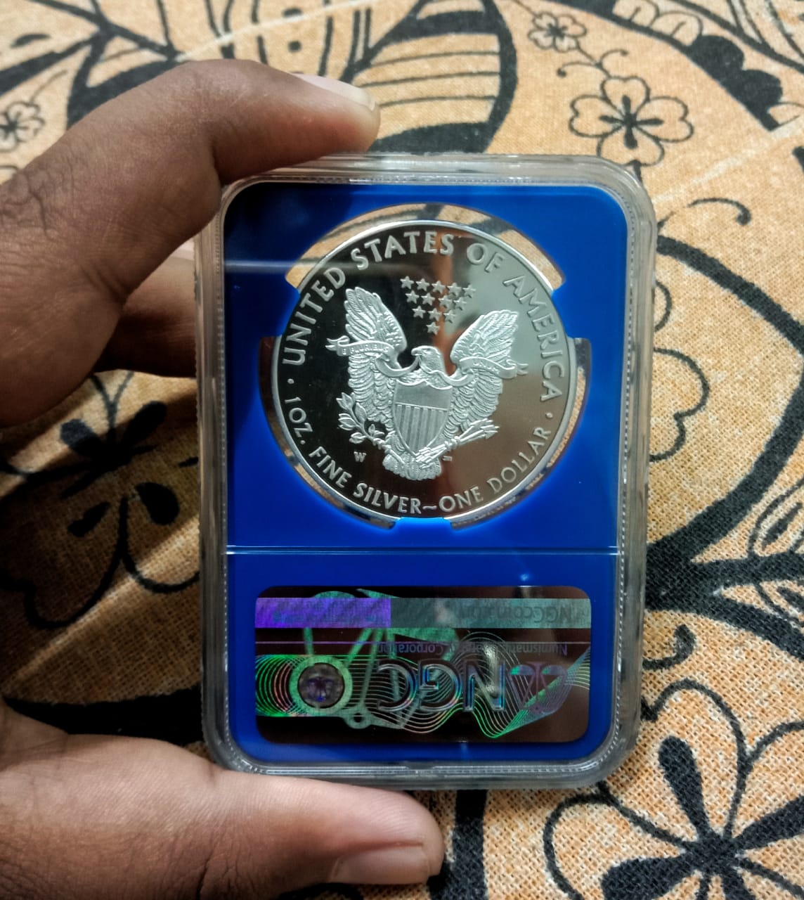 American Silver Eagle NGC graded coin featuring Mercanti's heraldic eagle reverse